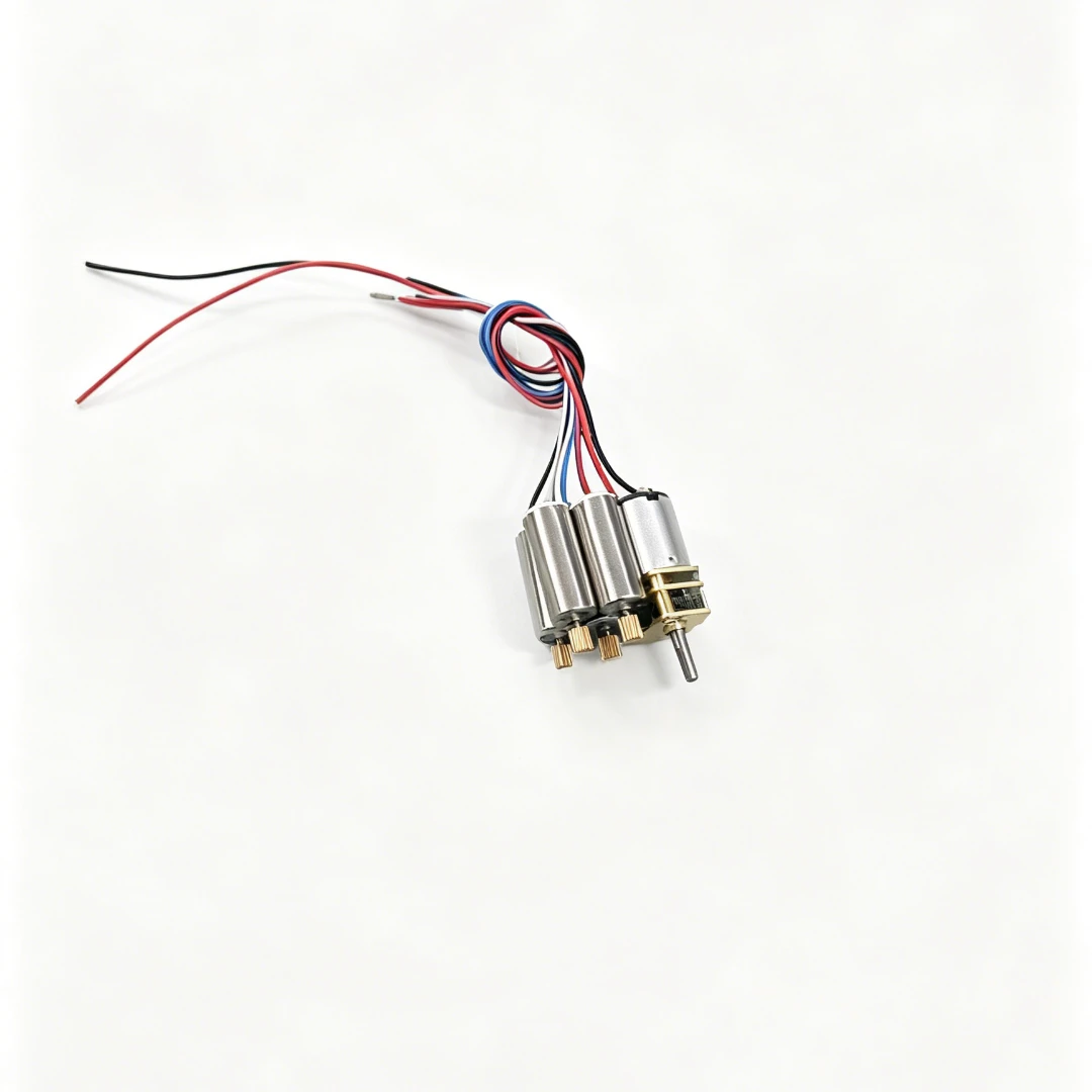 DIY Transforming Drone Materials Kit — Small wired motors with gears on a white background.