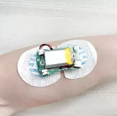 Sichiray Single-Channel sEMG Sensor Armband Development Kit — sEMG sensor module mounted on an arm with adhesive electrodes.
