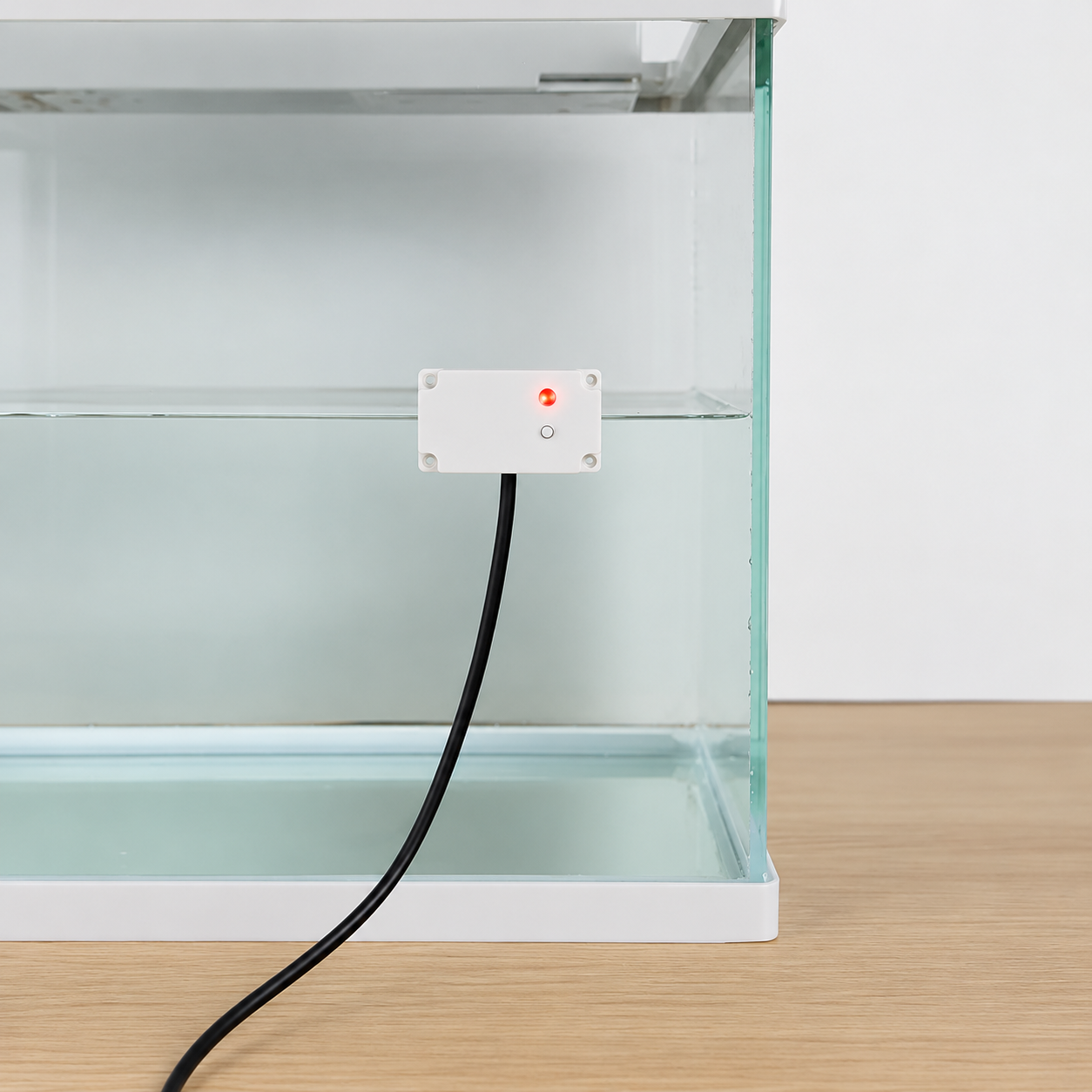 Y29A Non-Contact Capacitive Liquid Level Sensor — Y29A sensor mounted on the outside of a glass water container
